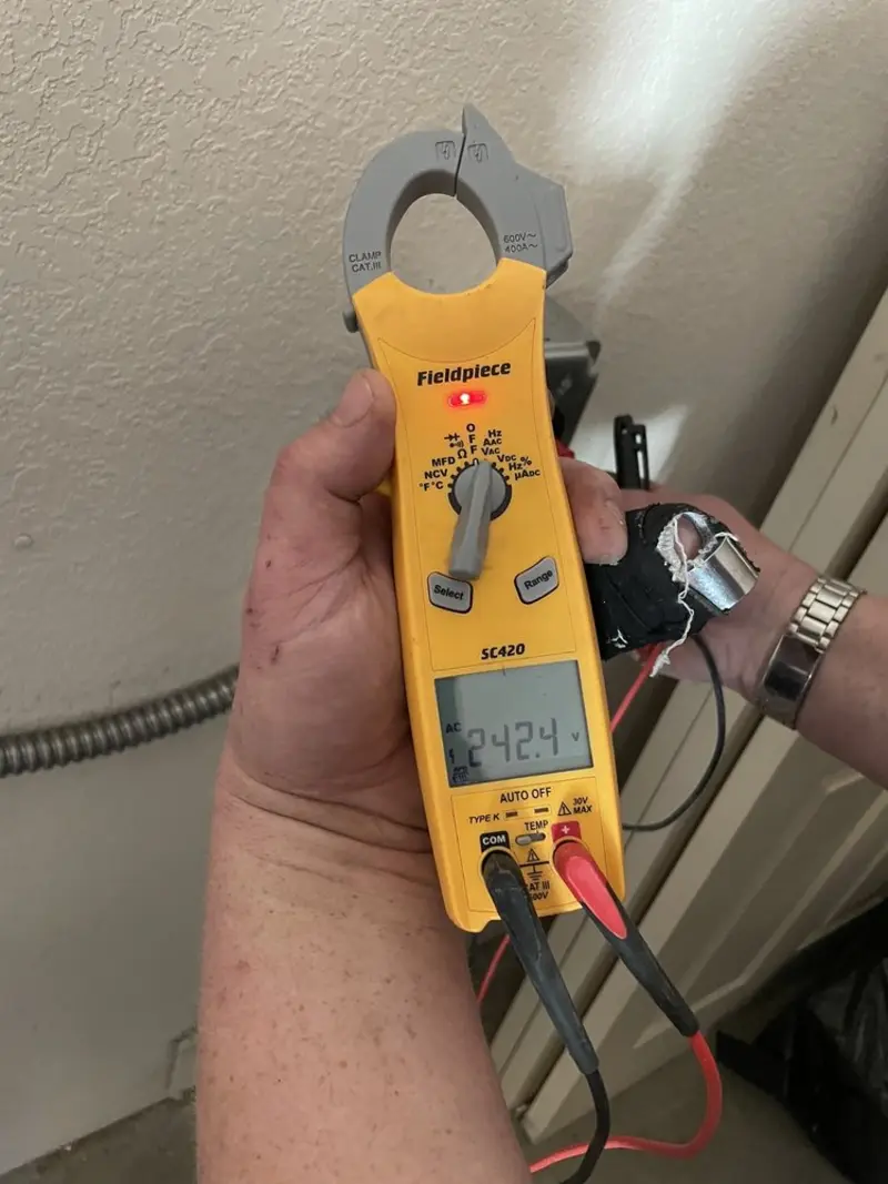 Voltage testing with clamp meter during Whole House Surge Protector in State College